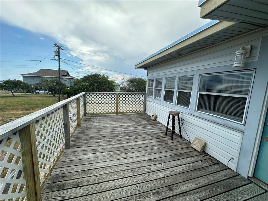 810 South Sandpiper Street Ingleside, TX 78362 - Photo 39 of 40 a view of a balcony with wooden floor