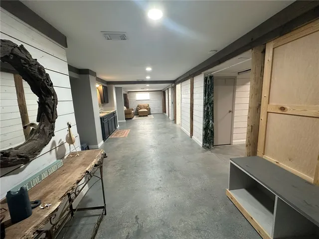 a view of a hallway with workspace