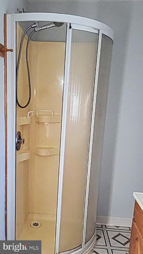 37 Schuyler Road Springfield, PA 19064 - Photo 11 of 29 a bathroom with a glass shower door