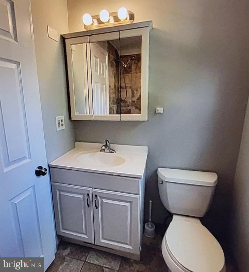 37 Schuyler Road Springfield, PA 19064 - Photo 20 of 29 a bathroom with a toilet sink and mirror
