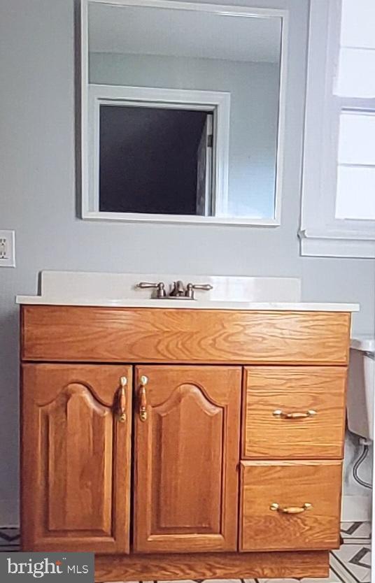 37 Schuyler Road Springfield, PA 19064 - Photo 10 of 29 a sink with a mirror