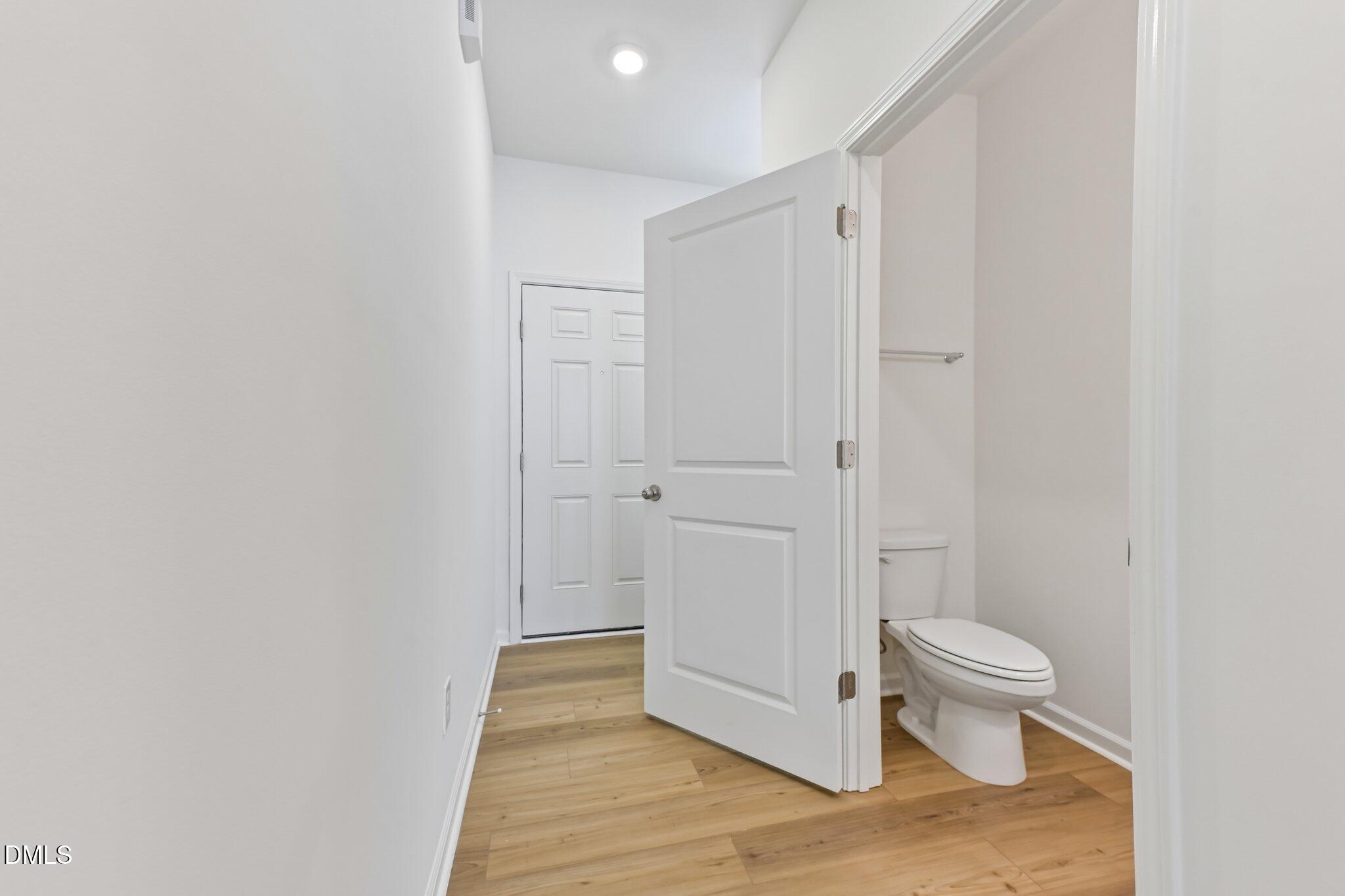 3019 Chrys Street Durham, NC 27704 - Photo 18 of 46 a bathroom with a toilet and a shower