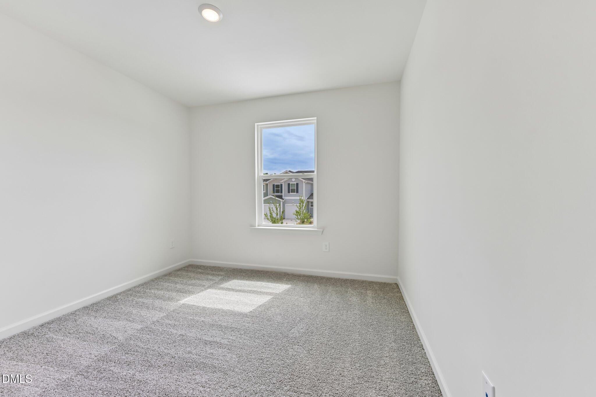 3019 Chrys Street Durham, NC 27704 - Photo 19 of 46 an empty room with a window