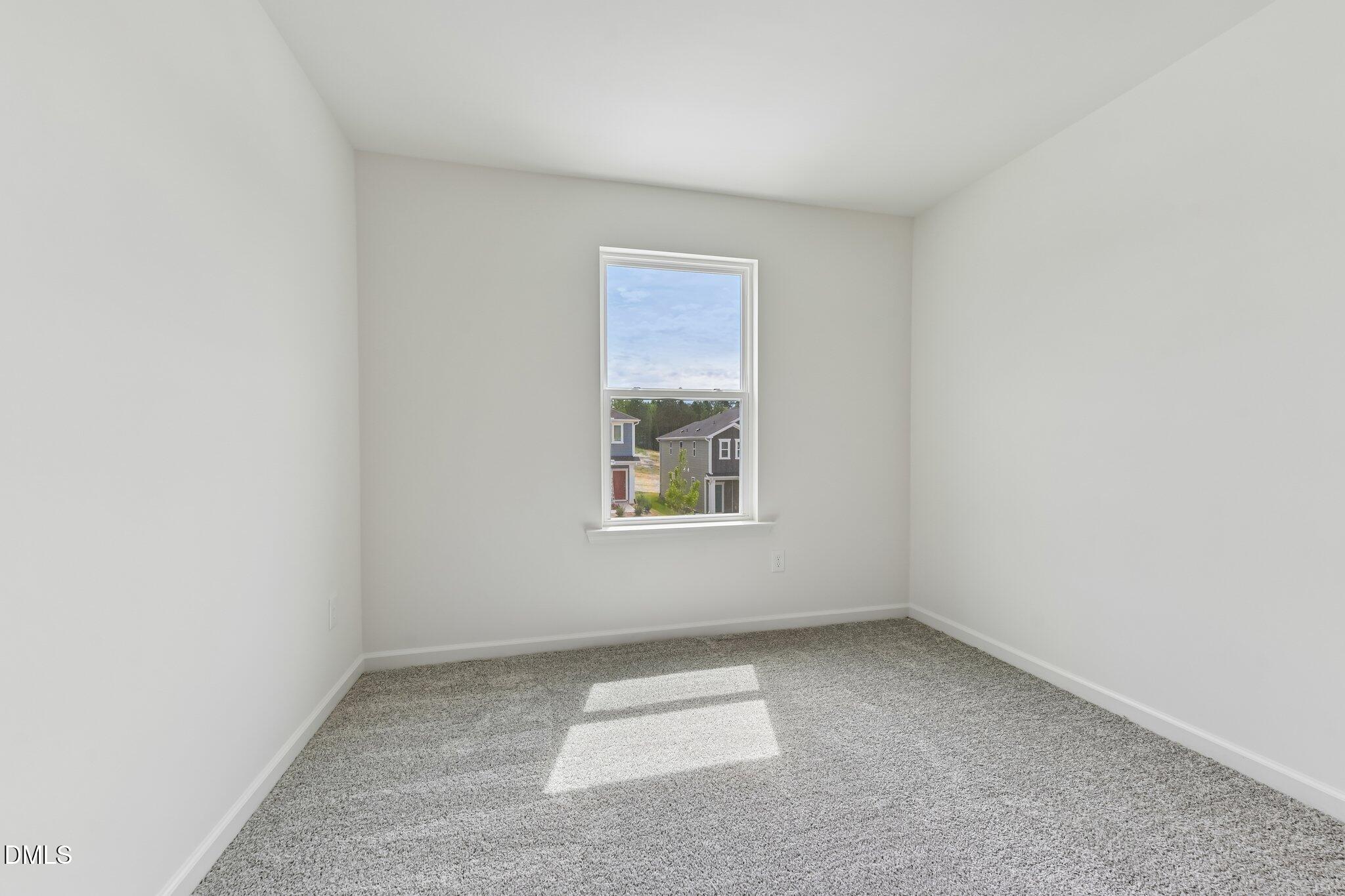 3019 Chrys Street Durham, NC 27704 - Photo 21 of 46 an empty room with a window