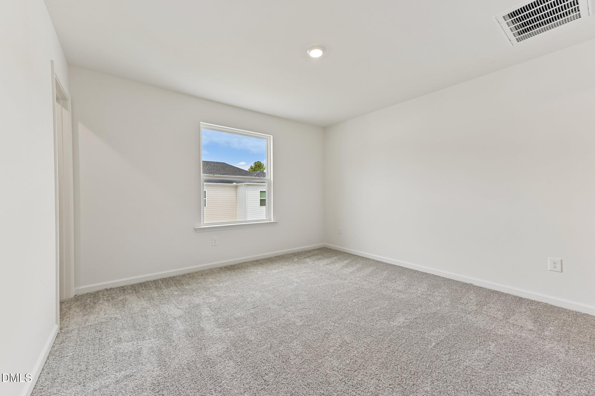 3019 Chrys Street Durham, NC 27704 - Photo 28 of 46 a view of an empty room with a window