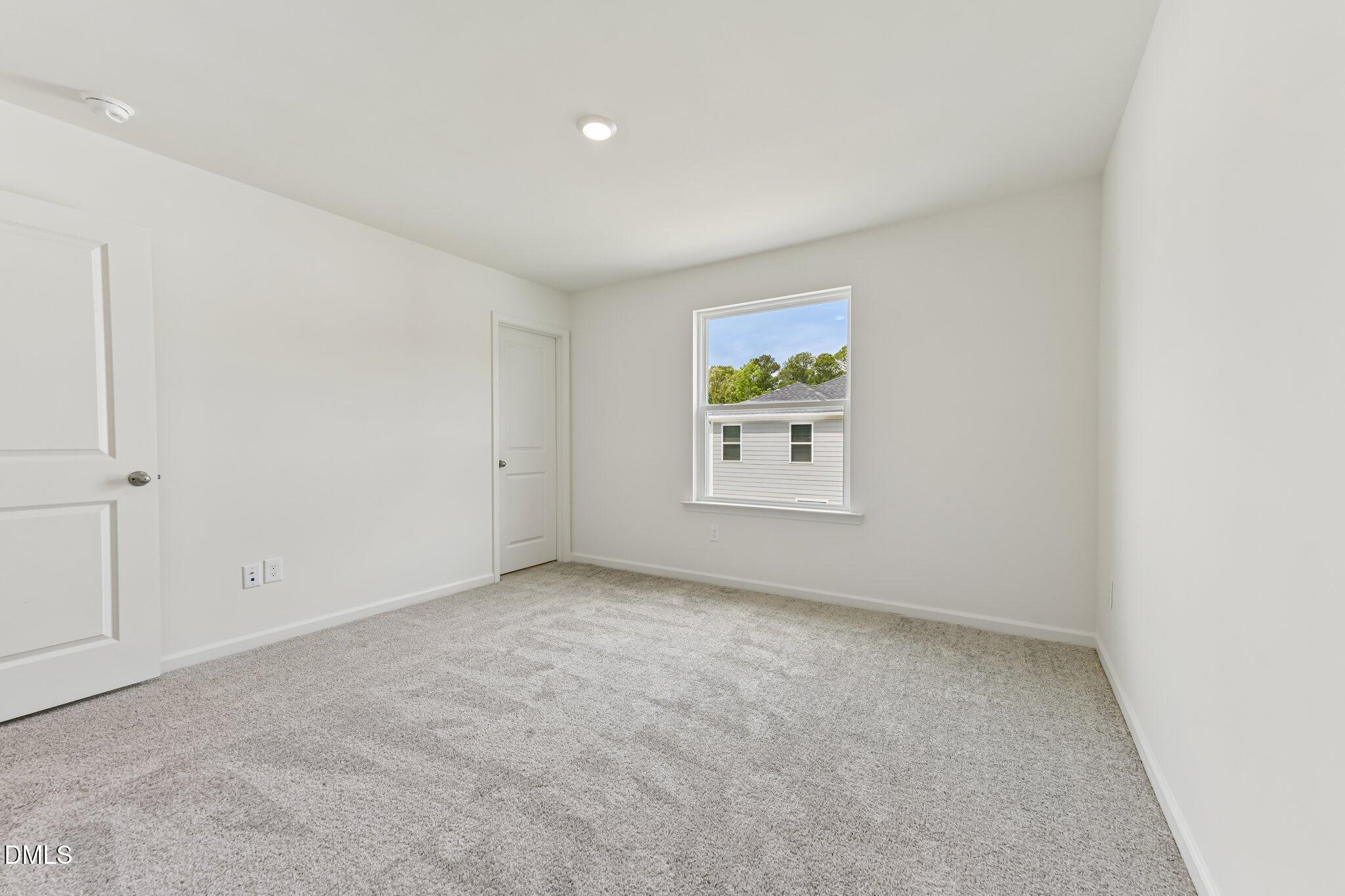 3019 Chrys Street Durham, NC 27704 - Photo 31 of 46 an empty room with windows