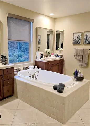 a kitchen with a sink a stove and cabinets