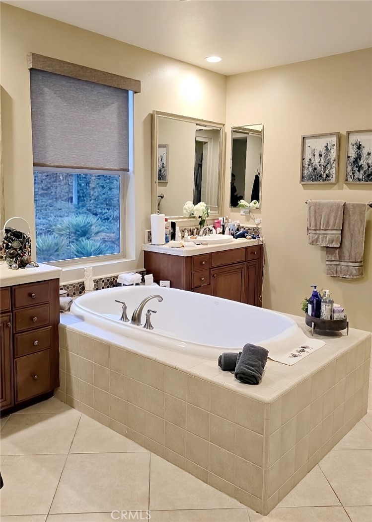 26661 Paseo Callado San Juan Capistrano, CA 92675 - Photo 13 of 25 a kitchen with a sink a stove and cabinets
