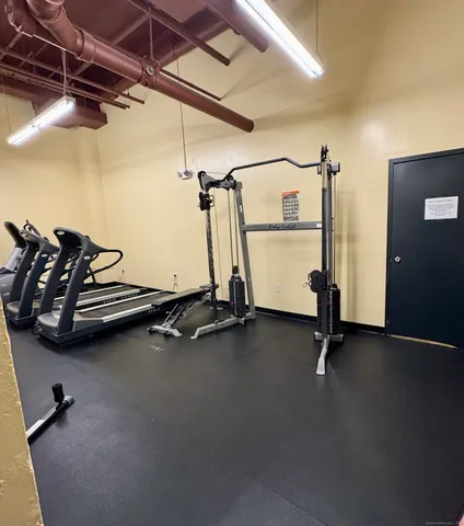a view of a room with gym equipment
