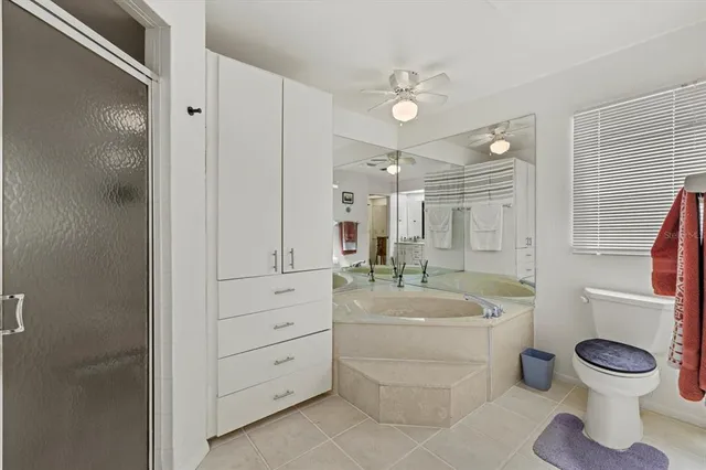 a bathroom with a sink double vanity and a shower