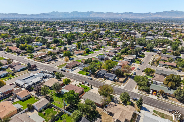 7391 Ramanee Drive Midvale, UT 84047 - Photo 44 of 45 Expansive neighborhood with mature tree coverage and distant mountains