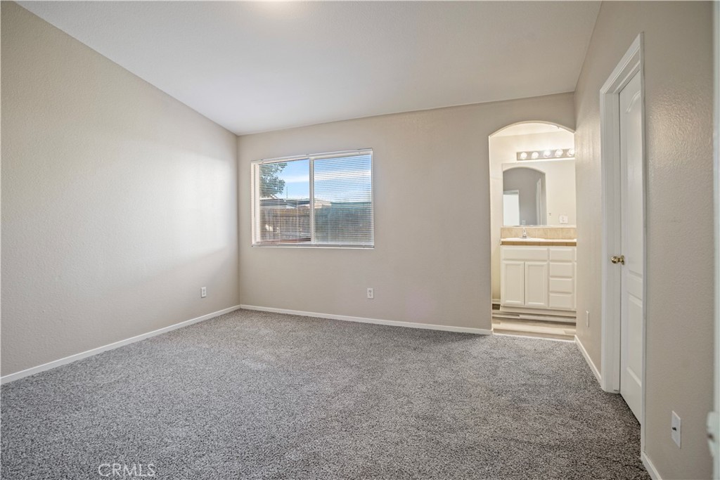 2139 Chesler Street Merced, CA 95348 - Photo 12 of 19 an empty room with windows and closet
