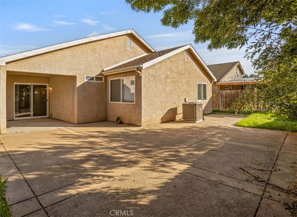 2139 Chesler Street Merced, CA 95348 - Photo 16 of 19 a view of a house with a backyard