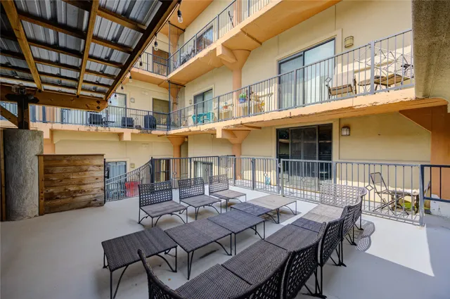 a view of a hallway with a potted plant