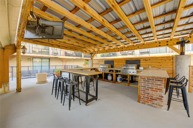 a kitchen with a potted plant on the counter