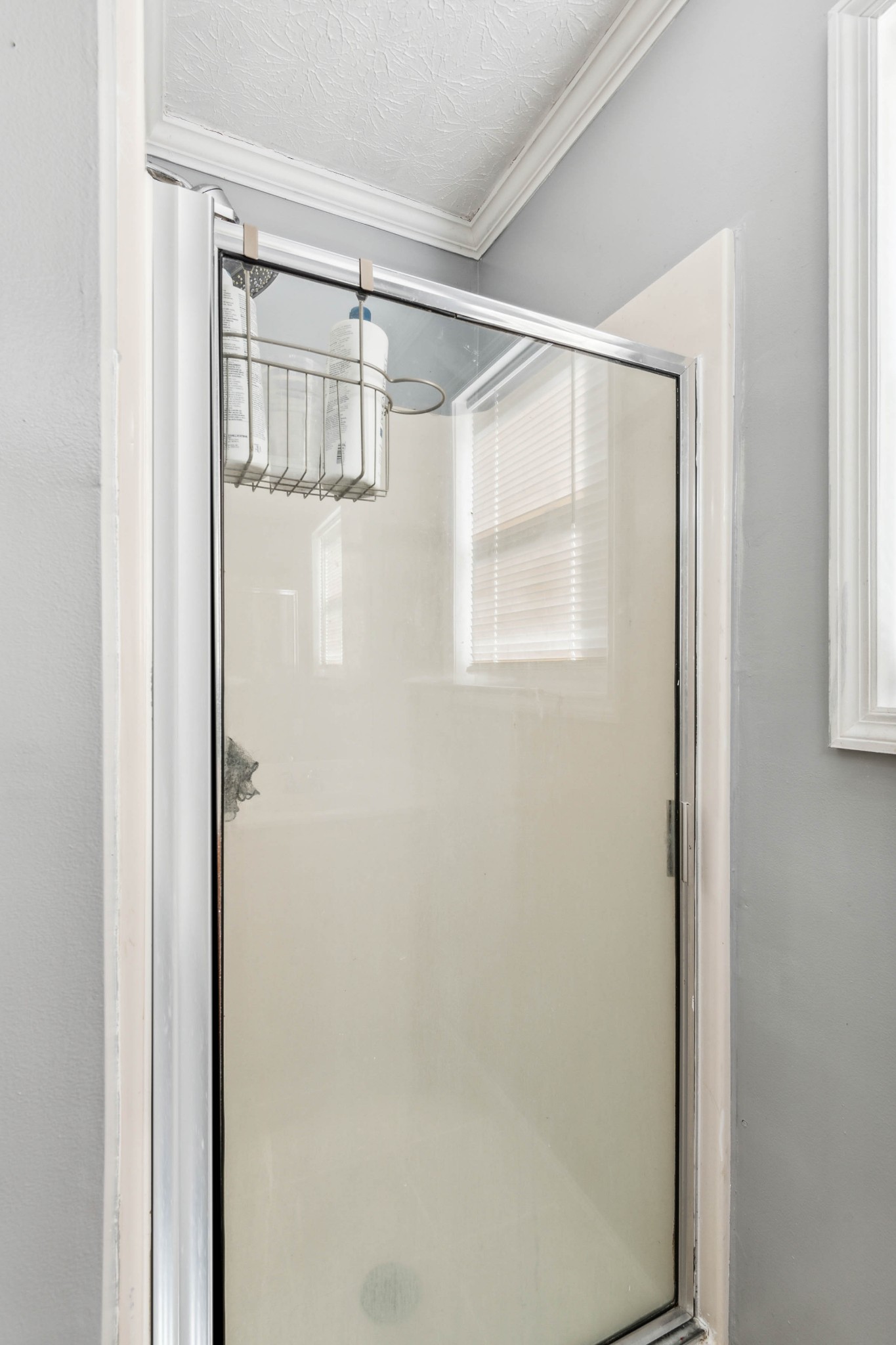 170 T G T Road Portland, TN 37148 - Photo 20 of 37 a bathroom with a glass shower door and mirror