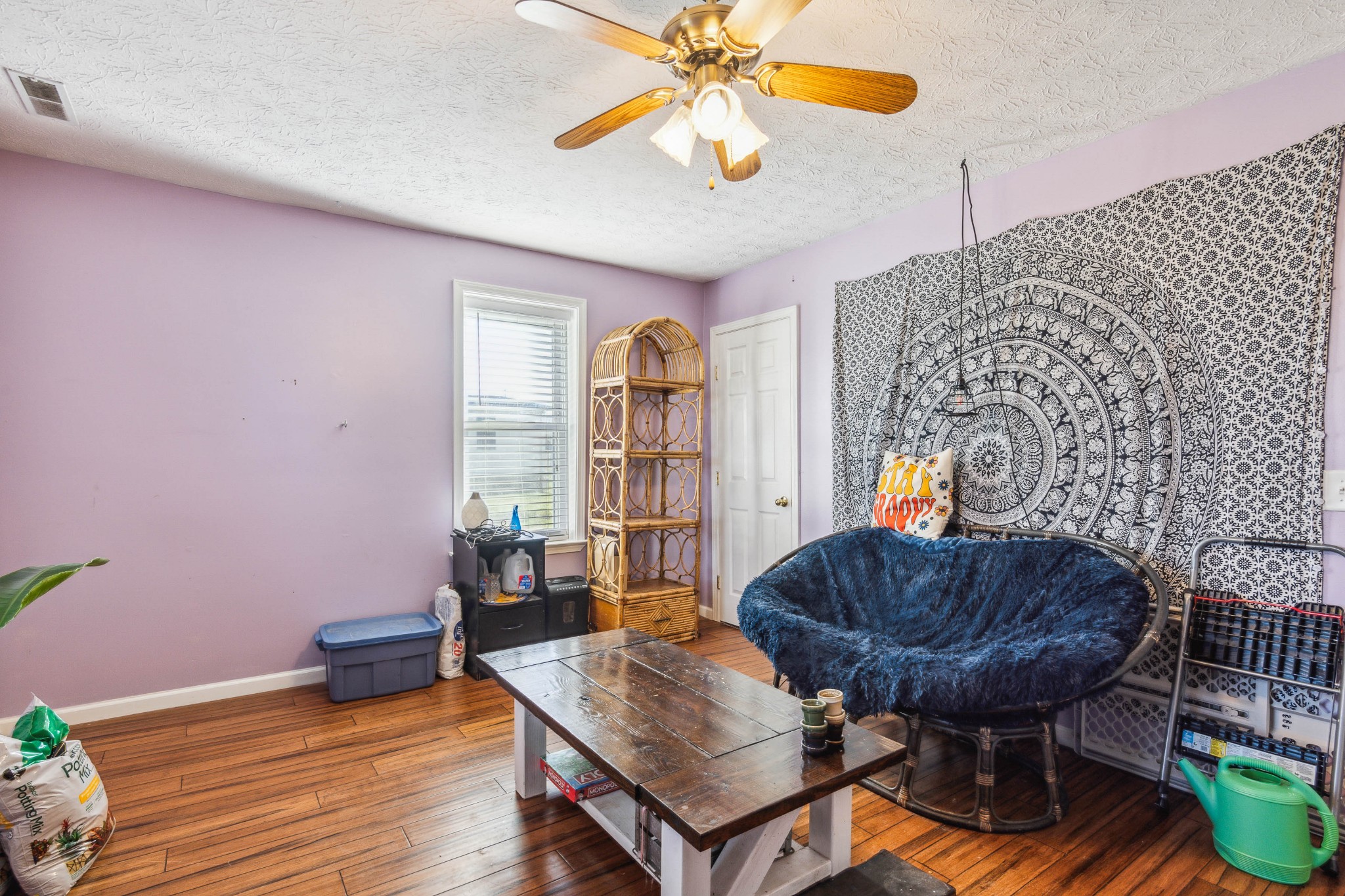 170 T G T Road Portland, TN 37148 - Photo 24 of 37 a living room with furniture and a wooden floor