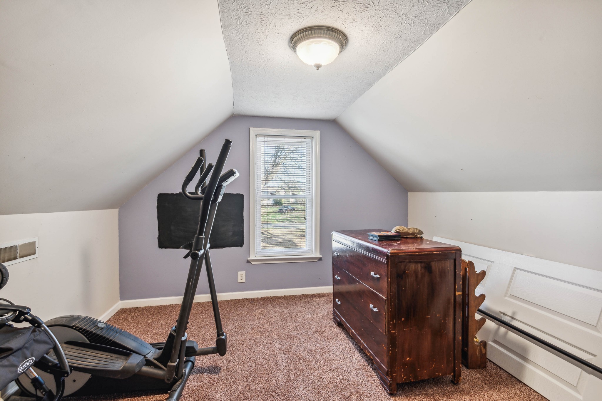 170 T G T Road Portland, TN 37148 - Photo 26 of 37 a room with gym equipment on wooden floor