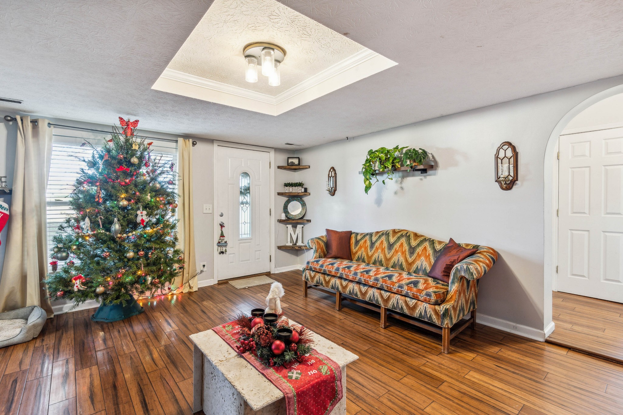 170 T G T Road Portland, TN 37148 - Photo 6 of 37 a living room with furniture and a potted plant