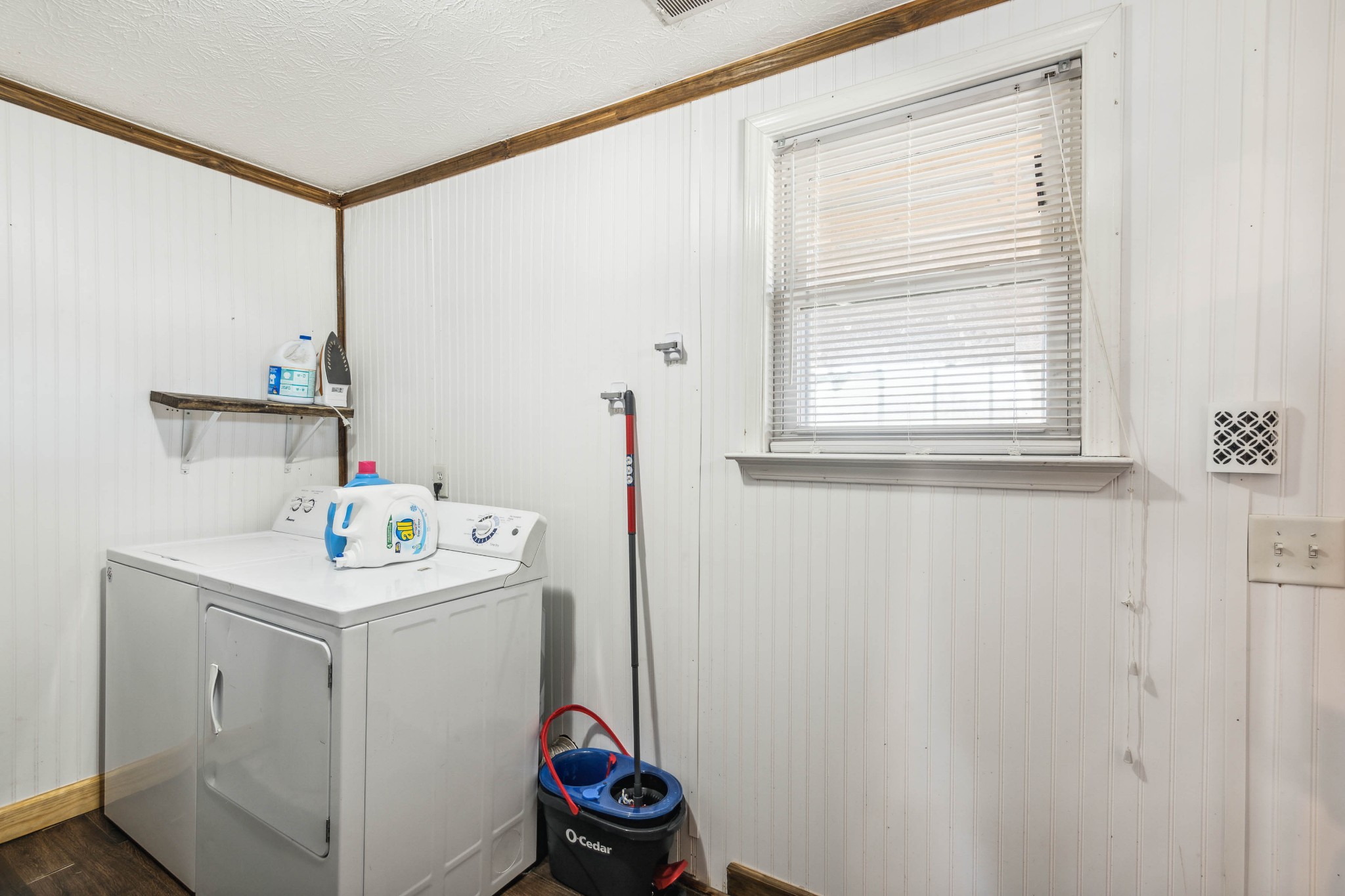170 T G T Road Portland, TN 37148 - Photo 9 of 37 a utility room with a window dryer and washer