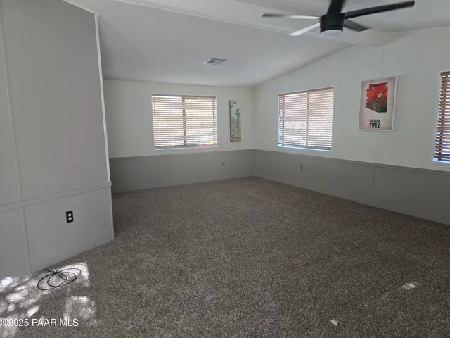 a kitchen with stainless steel appliances a refrigerator a stove a sink and a counter space