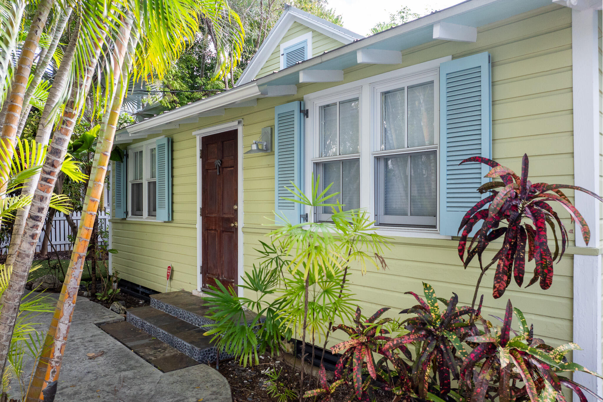 1120 Seminary Street Key West, FL 33040 - Photo 2 of 42 a view of a backyard with plants