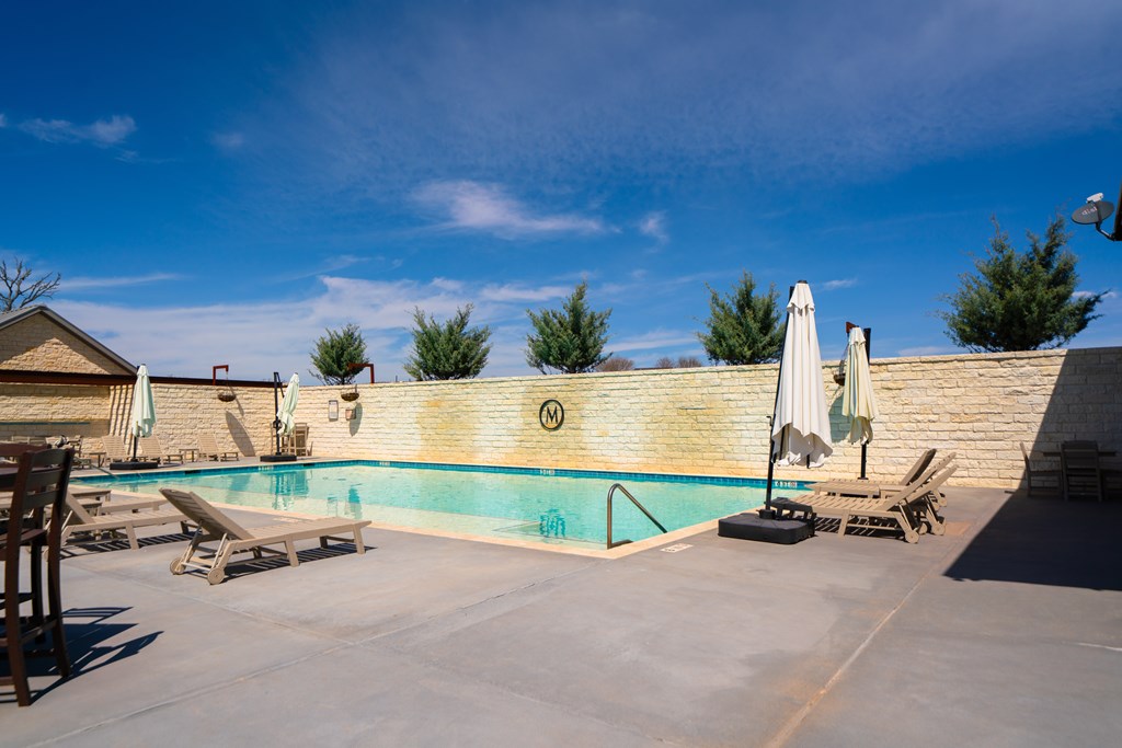 Lot 72 West Fallow Drive Harper, TX 78631 - Photo 13 of 30 a view of a swimming pool with a patio