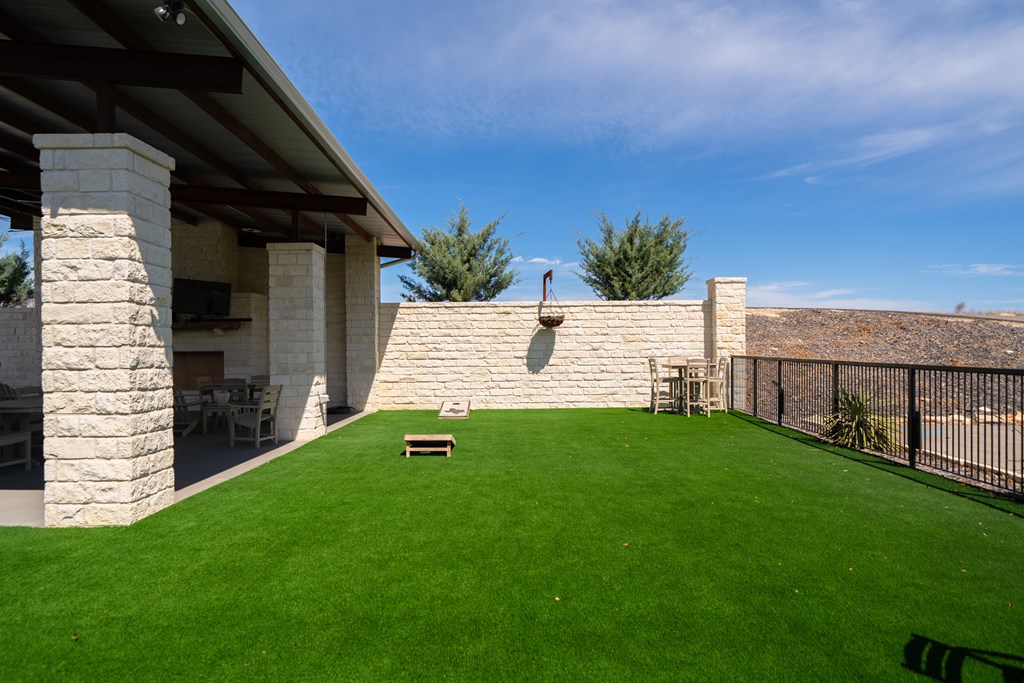 Lot 72 West Fallow Drive Harper, TX 78631 - Photo 16 of 30 a view of a backyard with plants