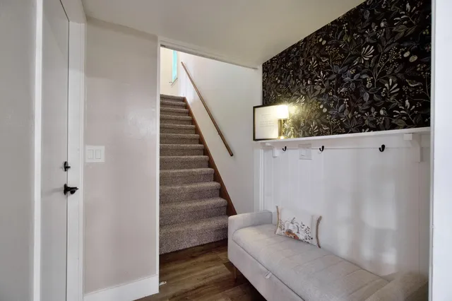 a view of entryway with stairs