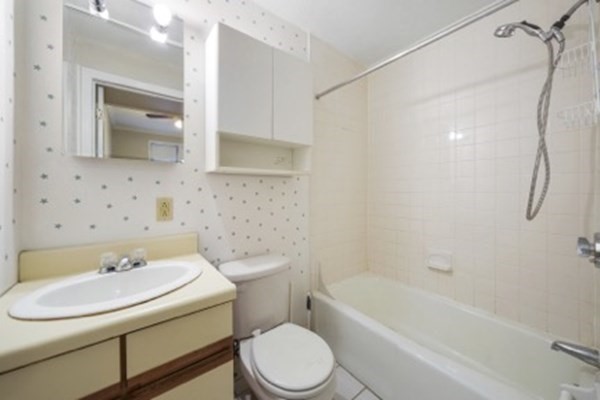 38-40 St Botolph Street, Unit 45 Boston, MA 02116 - Photo 4 of 8 a bathroom with a sink toilet and shower