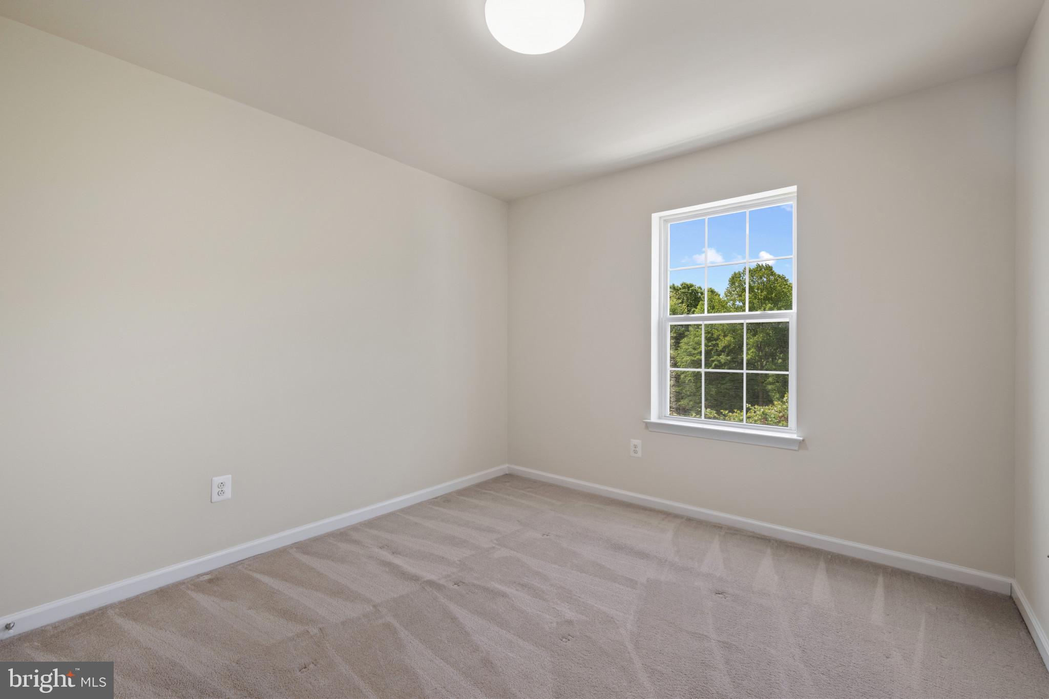 7062 Foxton Way Hanover, MD 21076 - Photo 20 of 41 an empty room with windows