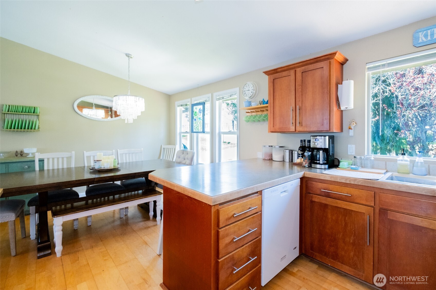 3780 Magrath Road Bellingham, WA 98226 - Photo 11 of 38 a kitchen with stainless steel appliances granite countertop a sink and a stove