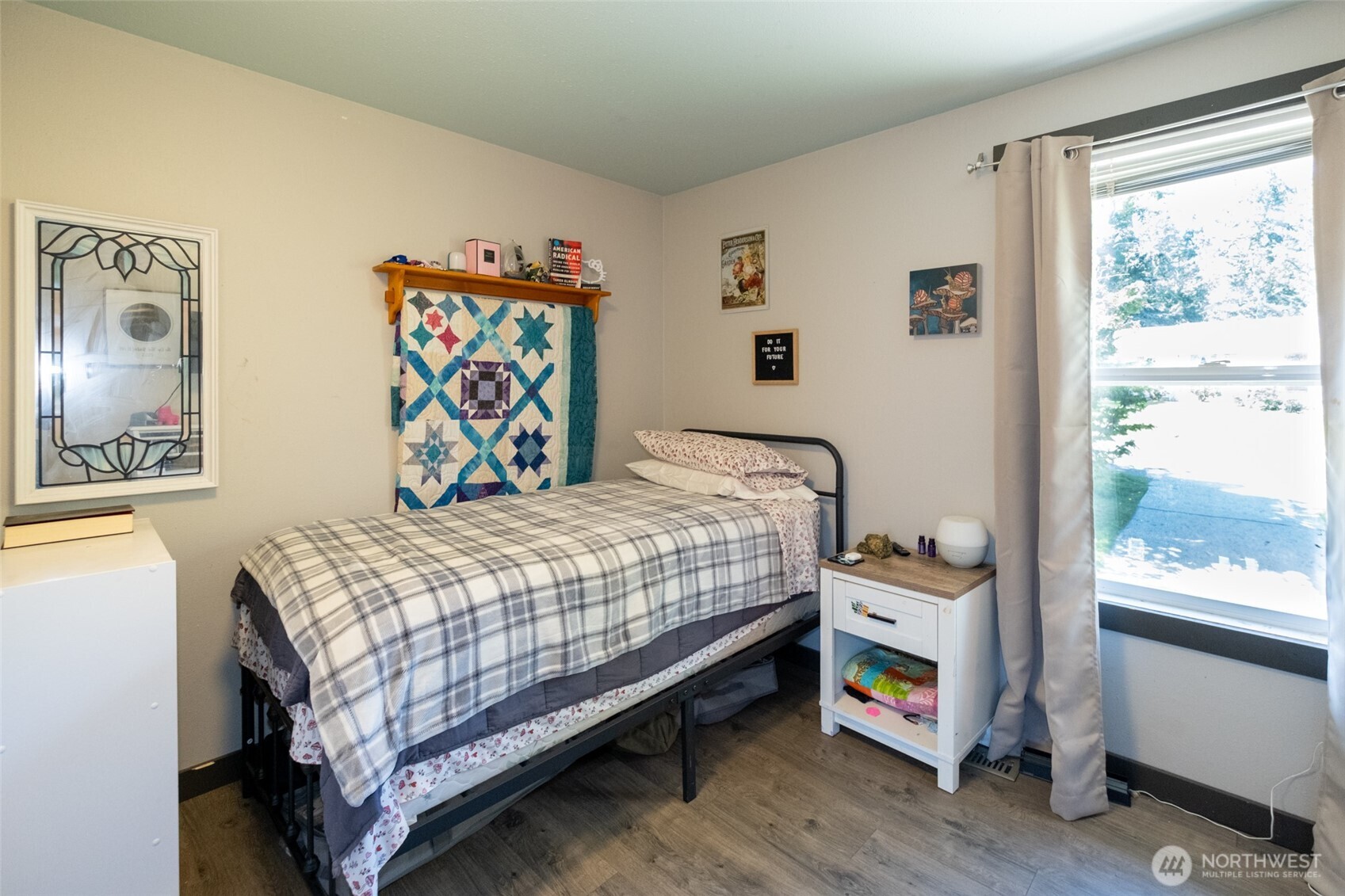 3780 Magrath Road Bellingham, WA 98226 - Photo 19 of 38 a bedroom with a bed and a window
