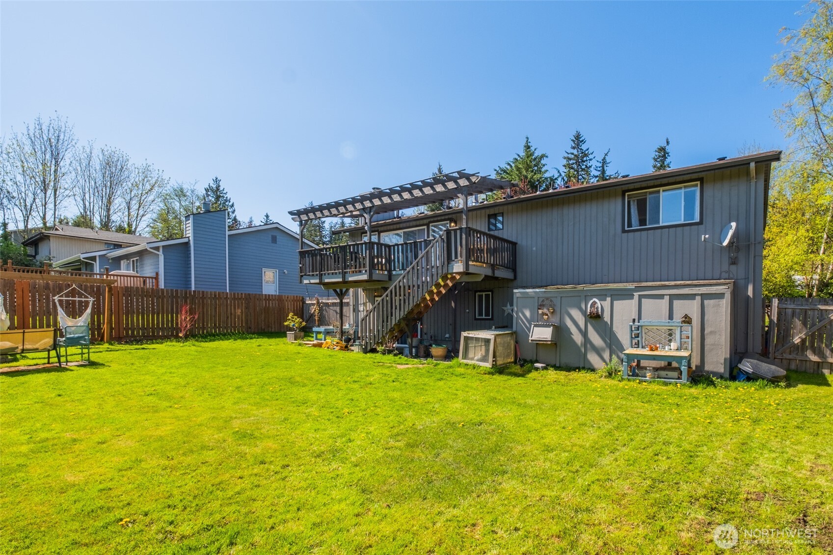 3780 Magrath Road Bellingham, WA 98226 - Photo 3 of 38 a view of a house with patio and a yard