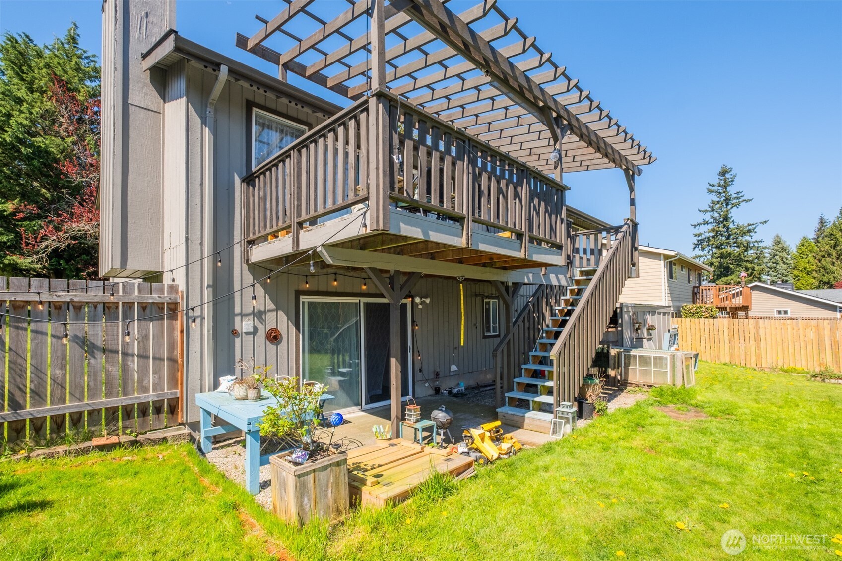 3780 Magrath Road Bellingham, WA 98226 - Photo 31 of 38 a view of a house with a patio
