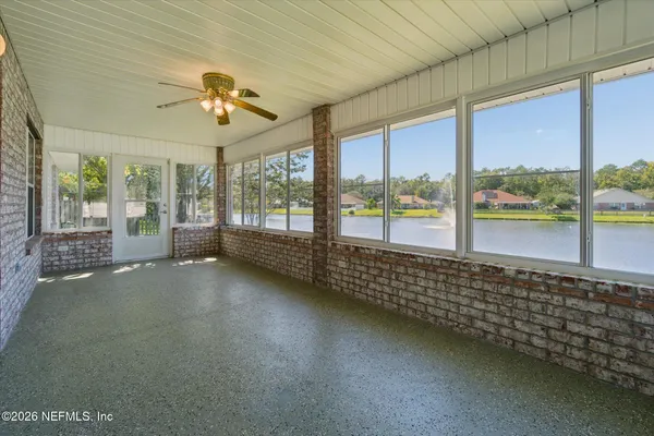 a view of an empty room and window