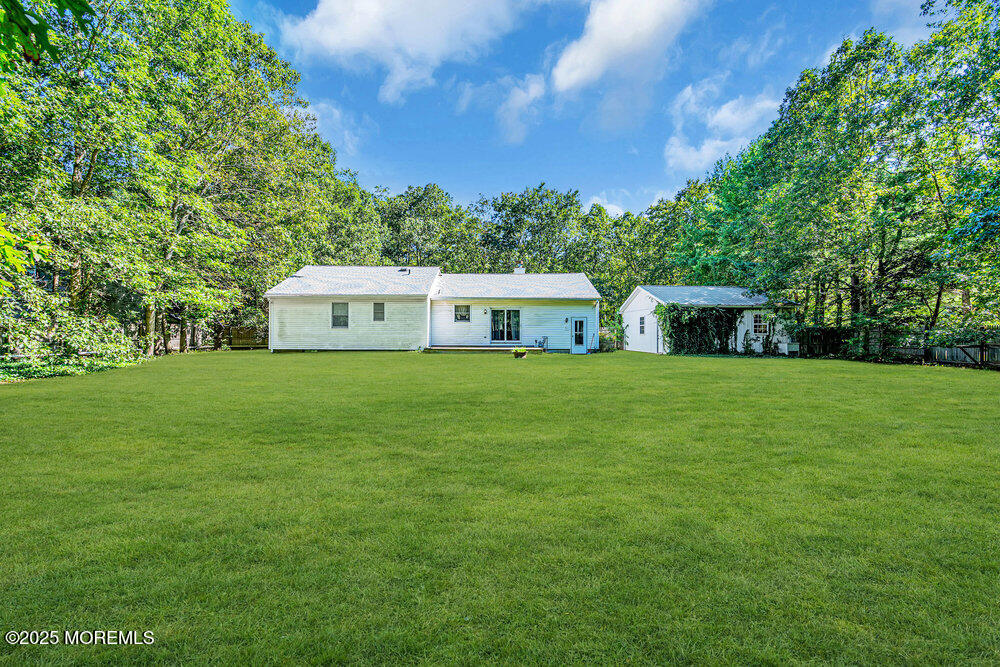 10 Bowman Road Jackson, NJ 08527 - Photo 15 of 16 a house view with a garden space