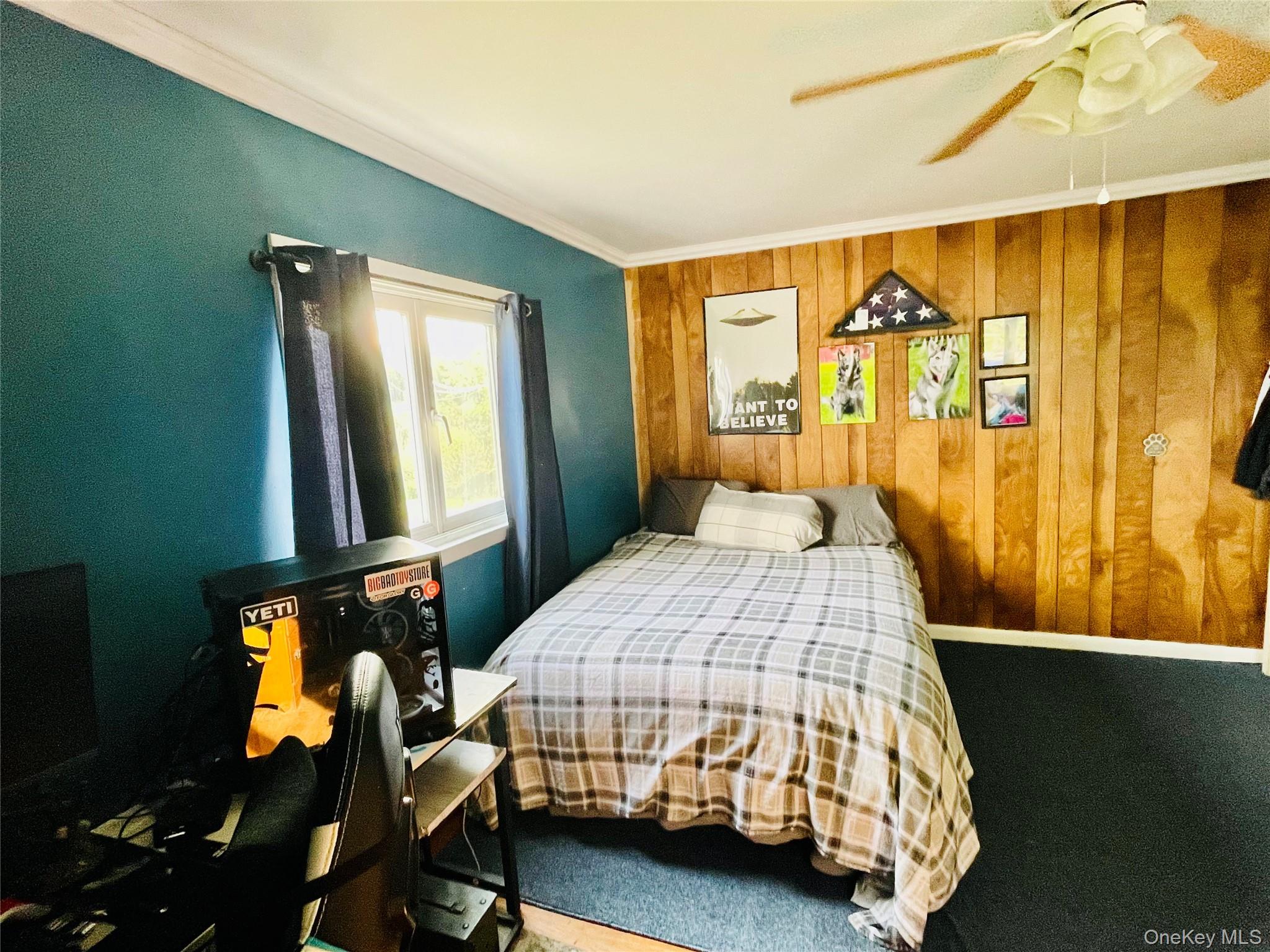 137 Cross Road Goshen, NY 10924 - Photo 20 of 50 a bedroom with a bed and wooden floor