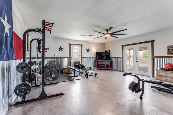 a view of a room with gym equipment