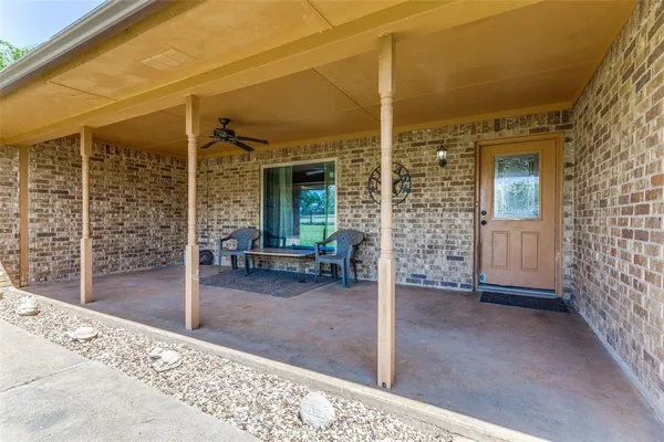 a view of a house with a porch