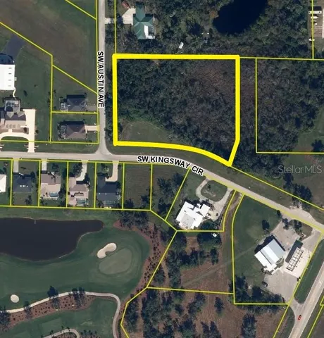 an aerial view of a house with a swimming pool