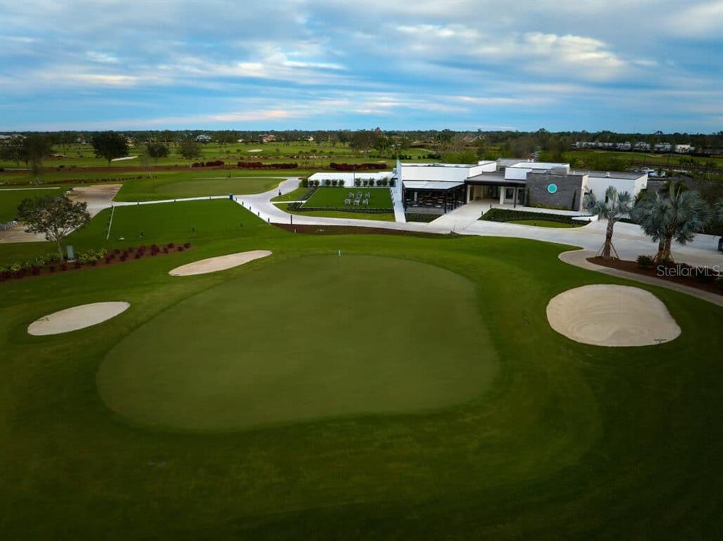12470 Southwest Austin Avenue Lake Suzy, FL 34269 - Photo 5 of 6 a view of a swimming pool with lawn chairs and couches