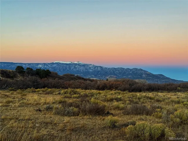 a view of lake with mountain
