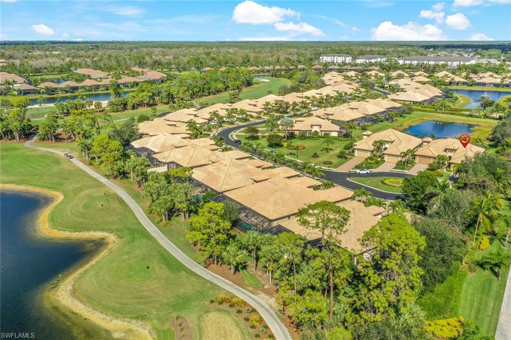 7598 Moorgate Point Way Naples, FL 34113 - Photo 29 of 33 a view of a city