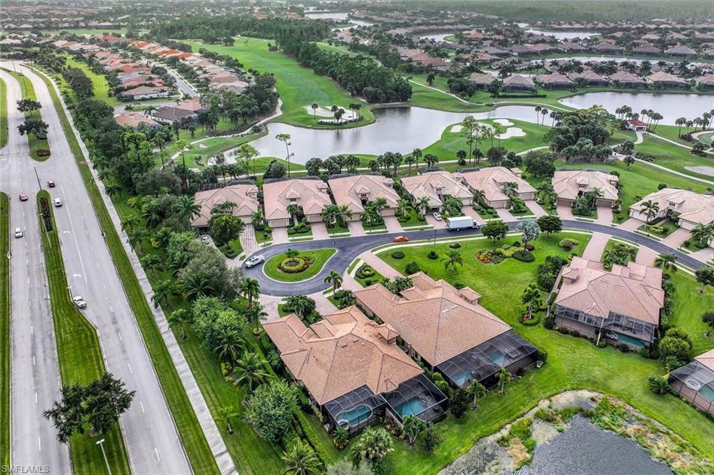 7598 Moorgate Point Way Naples, FL 34113 - Photo 32 of 33 an aerial view of a house with a garden