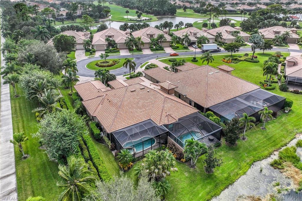 7598 Moorgate Point Way Naples, FL 34113 - Photo 33 of 33 an aerial view of a house with a garden