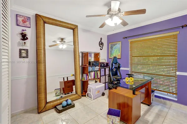 a view of a livingroom with furniture and a chandelier