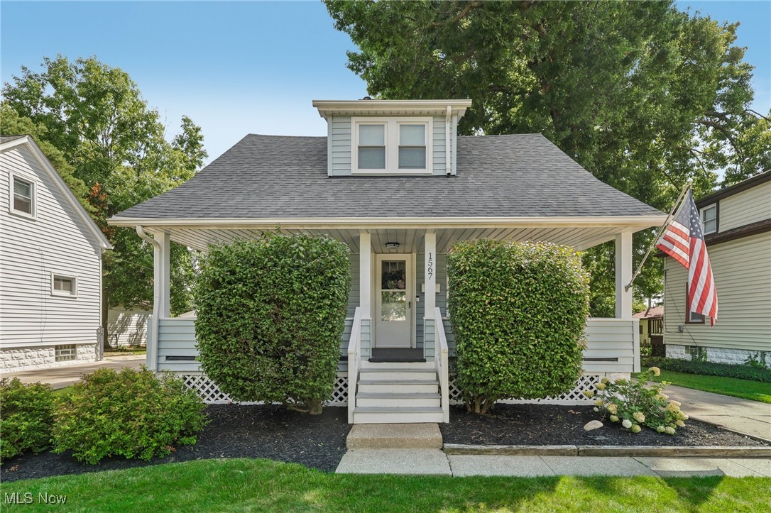 1567 Roselawn Road Cleveland, OH 44124 - Photo 1 of 29 View of front facade with covered porch