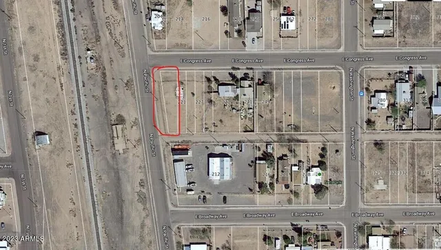 a view of a hallway with a white cabinets
