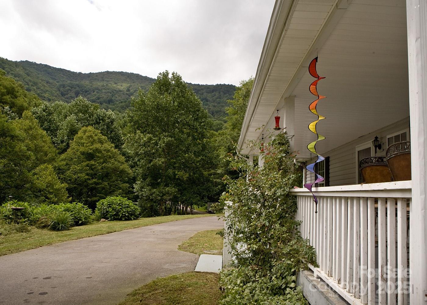 165 Peepeye Cove Road Leicester, NC 28748 - Photo 20 of 24 a view of a house with a street